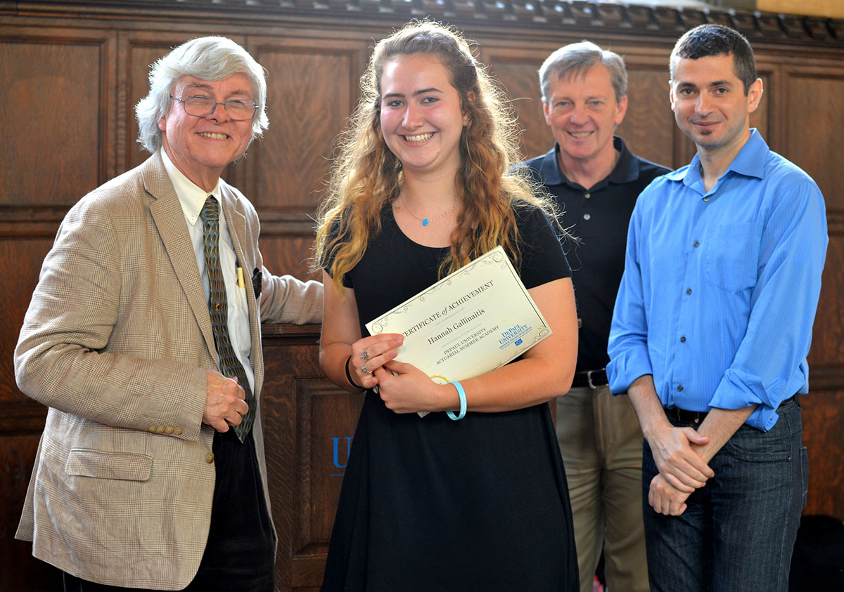 Hannah Gallinaitis from Hinsdale Central High School receives her graduation certificate from Actuarial Academy leaders 